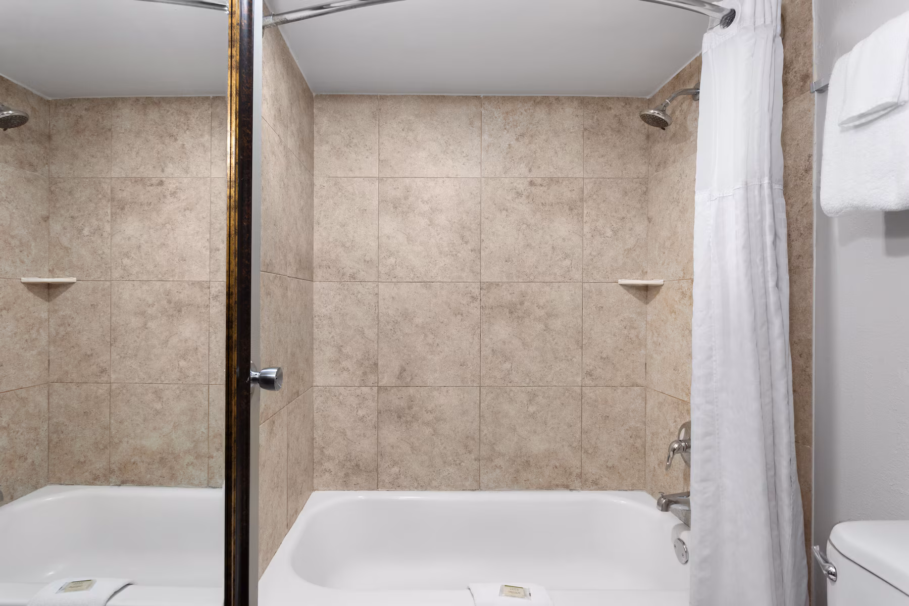 Bathroom with tub and shower